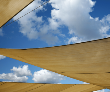 Outdoor shade sun sail for energy savings in summer